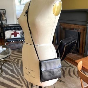 Tusk over the shoulder or Crossbody travel bag. Real beautiful leather.